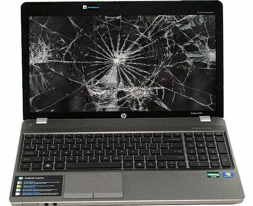 Laptop with a cracked screen awaiting screen replacement
