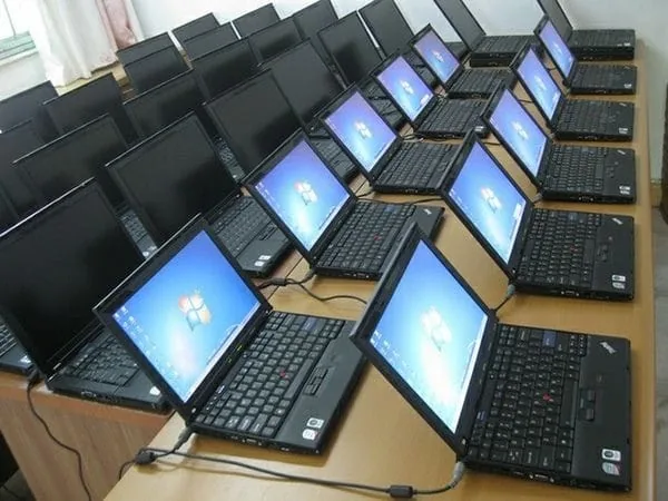Tested second hand laptops powered on and running at Renew Laptop Ahmedabad